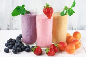 "A vibrant smoothie made with spinach or kale, bananas, berries, and almond milk, packed with vitamins and nutrients; boosted with Greek yogurt or protein powder for added nutrition."